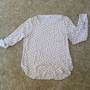 Light pink blouse with black flowers